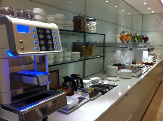 A view of the stretch of food and drink in the oneworld First Lounge at LAX.