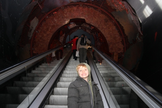 T on the "Visions of Earth" escalator at London's Natural History Museum.