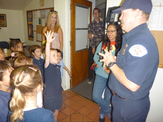 T raising his hand for the umpteenth time during his class field trip to the local fire station. I love that he's not afraid to ask questions!